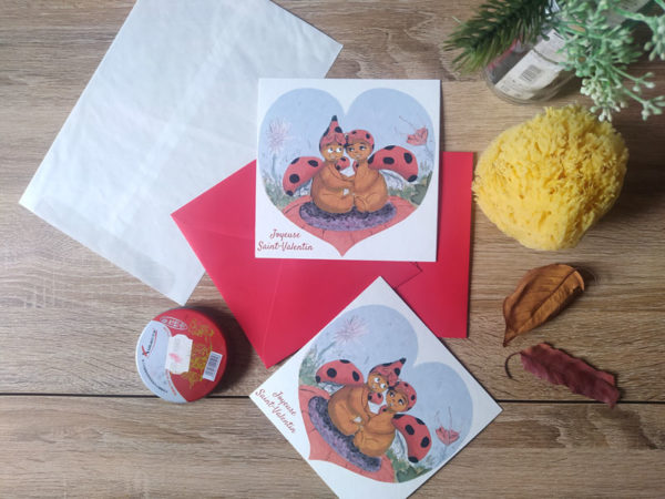 Carte de vœux "Joyeuse Saint-Valentin" représentant deux adorables coccinelles et peinte à l'aquarelle. Reproduction imprimée sur papier Fine Art.